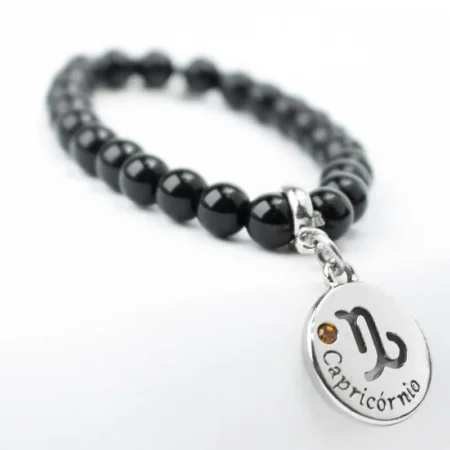 Pulseira de Signo de Capricórnio com Pedra Ônix - Elegância e Resiliência